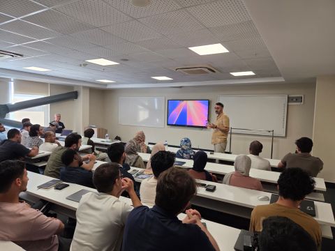 Prof. Abdulkadir Çelik presenting to CoSiNC researchers and students